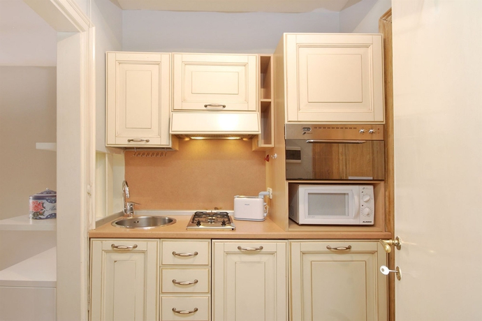 Imagen de la habitación del Casa de Huéspedes Frattina Apartments. Foto 4