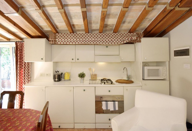 Imagen de la habitación del Casa de Huéspedes Frattina Apartments. Foto 6