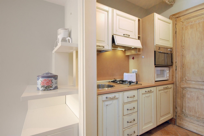 Imagen de la habitación del Casa de Huéspedes Frattina Apartments. Foto 7