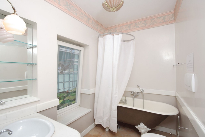 Imagen de la habitación del Casa de Huéspedes Frattina Apartments. Foto 8