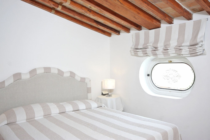 Imagen de la habitación del Casa de Huéspedes Frattina Apartments. Foto 14