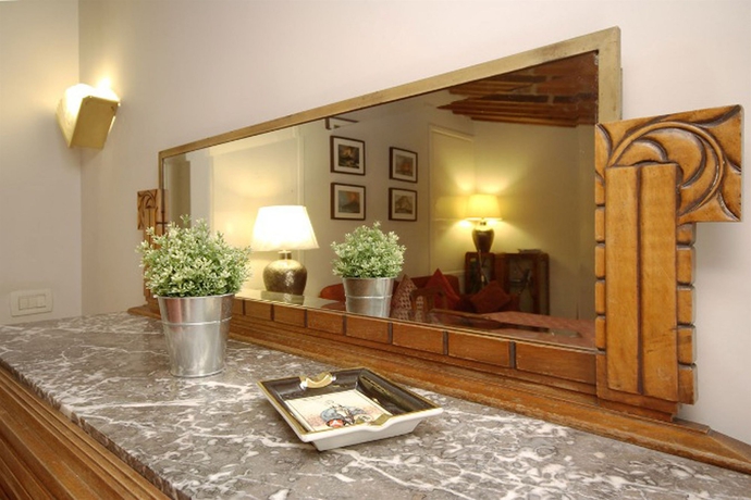 Imagen de la habitación del Casa de Huéspedes Frattina Apartments. Foto 15