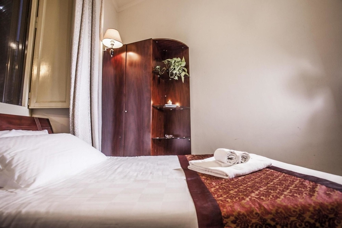 Imagen de la habitación del Casa de Huéspedes Giusi Rooms - Aetheria Esquilinus. Foto 10