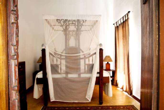 Imagen de la habitación del Casa de Huéspedes Hiliki House. Foto 10