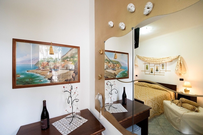 Imagen de la habitación del Casa de Huéspedes Holiday House Le Palme. Foto 3