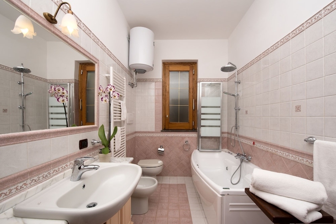 Imagen de la habitación del Casa de Huéspedes Holiday House Le Palme. Foto 5