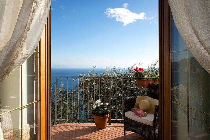 Imagen de la habitación del Casa de Huéspedes Holiday House Le Palme. Foto 7