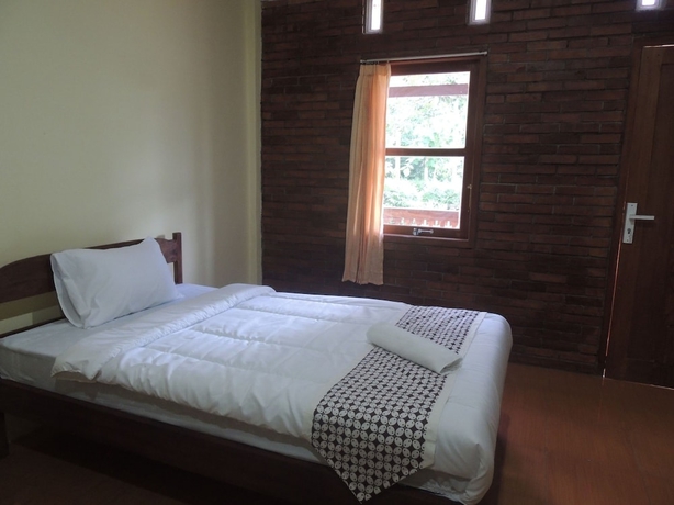 Imagen de la habitación del Casa de Huéspedes Homestay Effendi Borobudur Syariah by Ndalem Beong. Foto 10