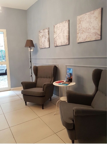 Imagen de los interiores del Casa de Huéspedes Hotel Meublè Santa Chiara Suite. Foto 17