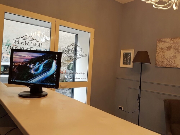 Imagen de los interiores del Casa de Huéspedes Hotel Meublè Santa Chiara Suite. Foto 19