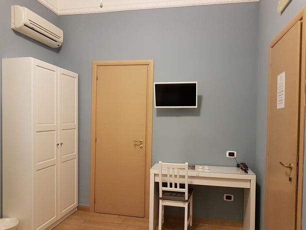 Imagen de la habitación del Casa de Huéspedes Hotel Meublè Santa Chiara Suite. Foto 7