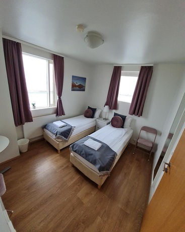 Imagen de la habitación del Casa de Huéspedes Höfn Guesthouse. Foto 4