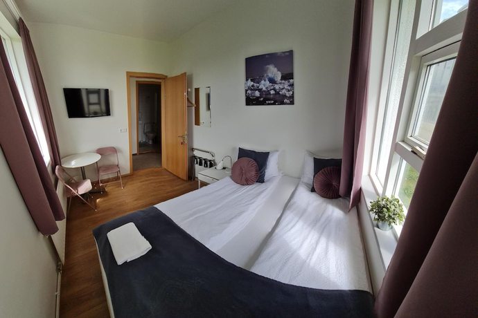 Imagen de la habitación del Casa de Huéspedes Höfn Guesthouse. Foto 11