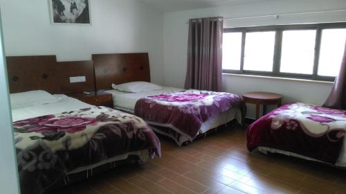 Imagen de la habitación del Casa de Huéspedes Huang Mountain Yiyun Buffet Family. Foto 4