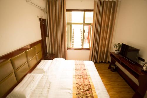 Imagen de la habitación del Casa de Huéspedes Huashan Mountain Spring. Foto 6