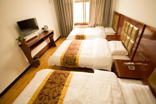 Imagen de la habitación del Casa de Huéspedes Huashan Mountain Spring. Foto 7