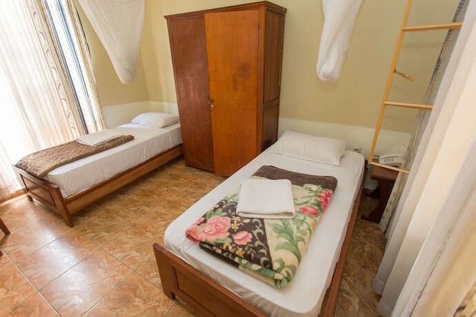 Imagen de la habitación del Casa de Huéspedes Iris, Kigali. Foto 14