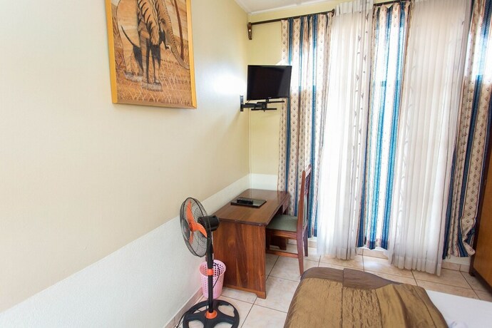 Imagen de la habitación del Casa de Huéspedes Iris, Kigali. Foto 16