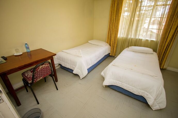 Imagen de la habitación del Casa de Huéspedes Jumuia Guest House Nakuru. Foto 17