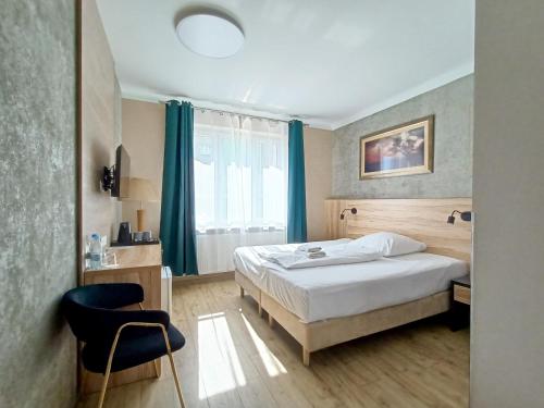 Imagen de la habitación del Casa de Huéspedes Kamienica Morska Gdynia. Foto 14