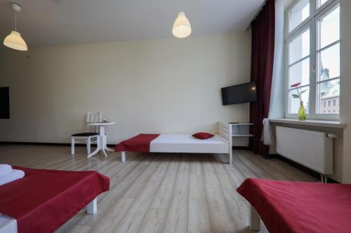 Imagen de la habitación del Casa de Huéspedes Kamienica Pod Aniołami. Foto 5