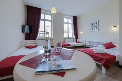 Imagen de la habitación del Casa de Huéspedes Kamienica Pod Aniołami. Foto 6