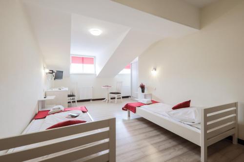 Imagen de la habitación del Casa de Huéspedes Kamienica Pod Aniołami. Foto 8