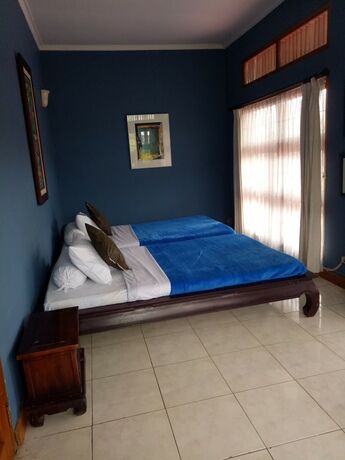 Imagen de la habitación del Casa de Huéspedes Kembang, Parongpong. Foto 12