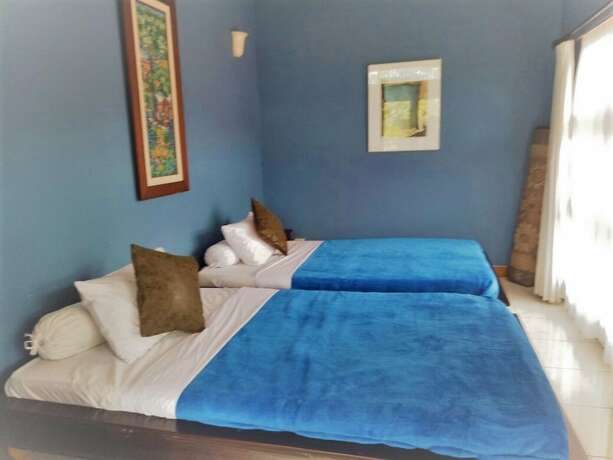 Imagen de la habitación del Casa de Huéspedes Kembang, Parongpong. Foto 15