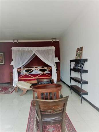 Imagen de la habitación del Casa de Huéspedes Kembang, Parongpong. Foto 22