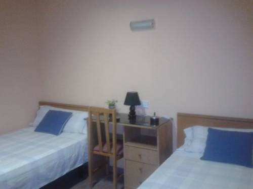 Imagen de la habitación del Casa de Huéspedes La Asturiana. Foto 6