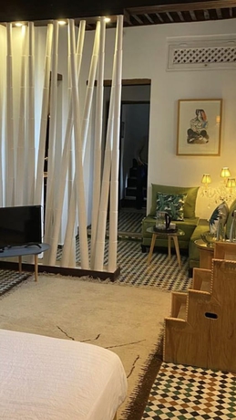 Imagen de la habitación del Casa de Huéspedes La Maison Maure. Foto 13