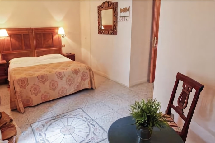 Imagen de la habitación del Casa de Huéspedes La Maison de Marta. Foto 8