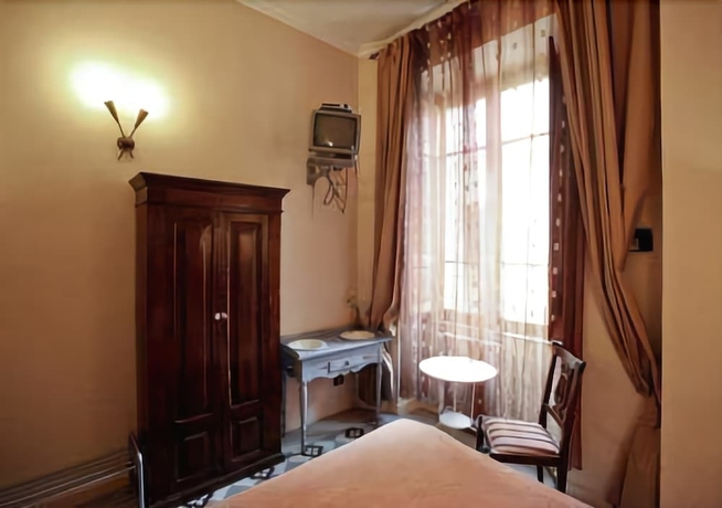 Imagen de la habitación del Casa de Huéspedes La Maison de Marta. Foto 9