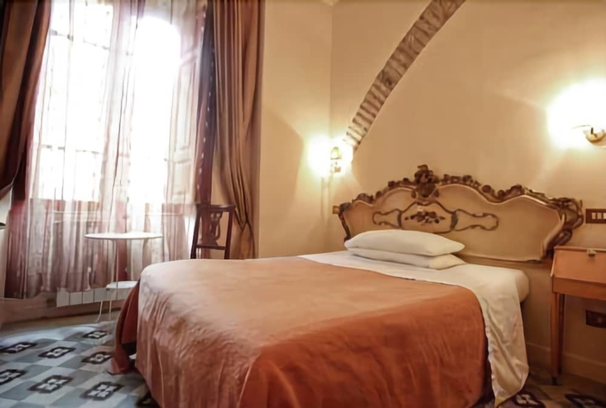 Imagen de la habitación del Casa de Huéspedes La Maison de Marta. Foto 12