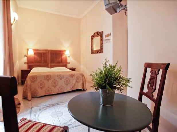 Imagen de la habitación del Casa de Huéspedes La Maison de Marta. Foto 17