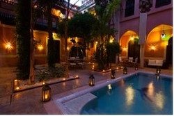 Imagen de la piscina del Casa de Huéspedes Le Perroquet Bleu. Foto 13