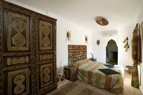 Imagen de la habitación del Casa de Huéspedes Les Jardins Mandaline. Foto 7