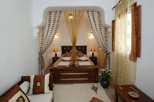 Imagen de la habitación del Casa de Huéspedes Les Jardins Mandaline. Foto 8