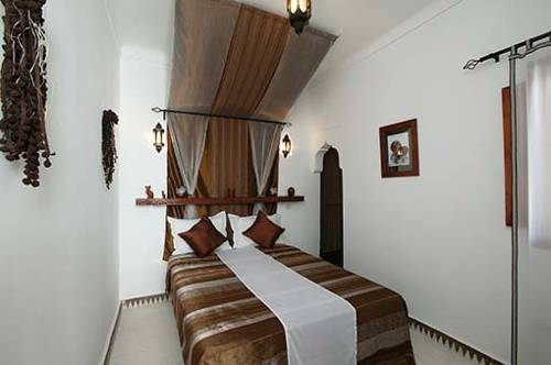 Imagen de la habitación del Casa de Huéspedes Les Jardins Mandaline. Foto 10