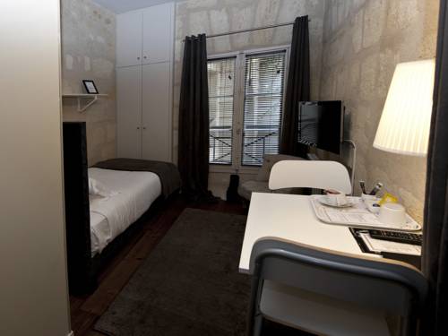 Imagen de la habitación del Casa de Huéspedes L'hôtel Particulier. Foto 10