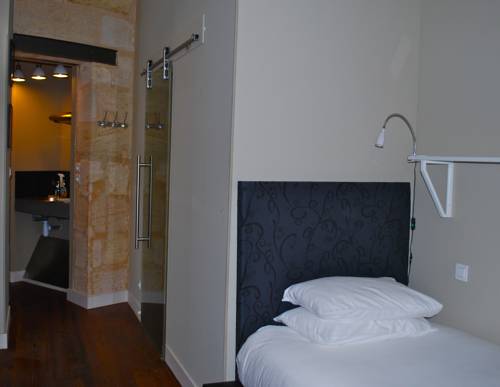 Imagen de la habitación del Casa de Huéspedes L'hôtel Particulier. Foto 11