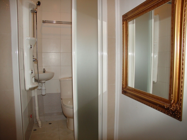 Imagen de la habitación del Casa de Huéspedes Lily Garden Guest House. Foto 2
