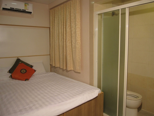 Imagen de la habitación del Casa de Huéspedes Lily Garden Guest House. Foto 3