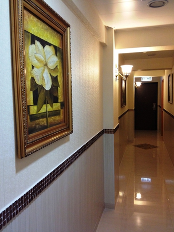 Imagen de los interiores del Casa de Huéspedes Lily Garden Guest House. Foto 12