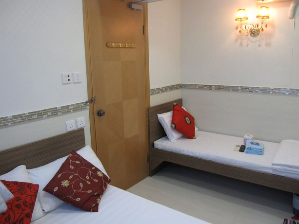 Imagen de la habitación del Casa de Huéspedes Lily Garden Guest House. Foto 7