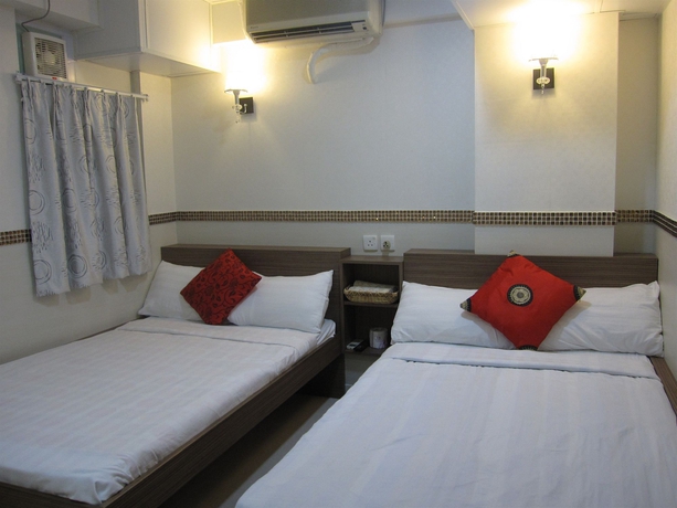 Imagen de la habitación del Casa de Huéspedes Lily Garden Guest House. Foto 8
