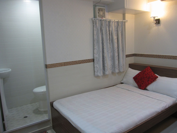 Imagen de la habitación del Casa de Huéspedes Lily Garden Guest House. Foto 10