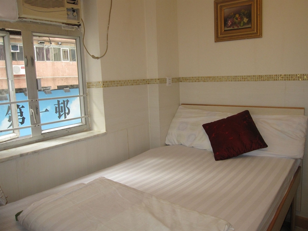 Imagen de la habitación del Casa de Huéspedes Lily Garden Guest House. Foto 11