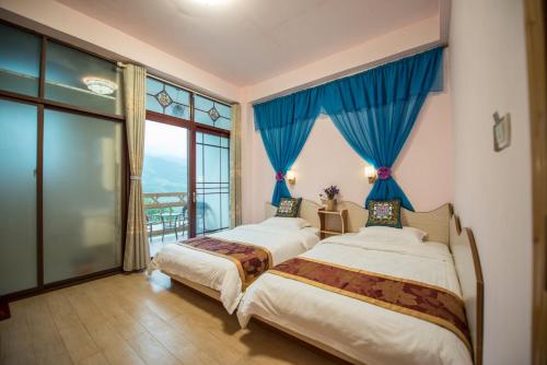 Imagen de la habitación del Casa de Huéspedes Longji Rice Terraces Green View Guesthouse. Foto 5